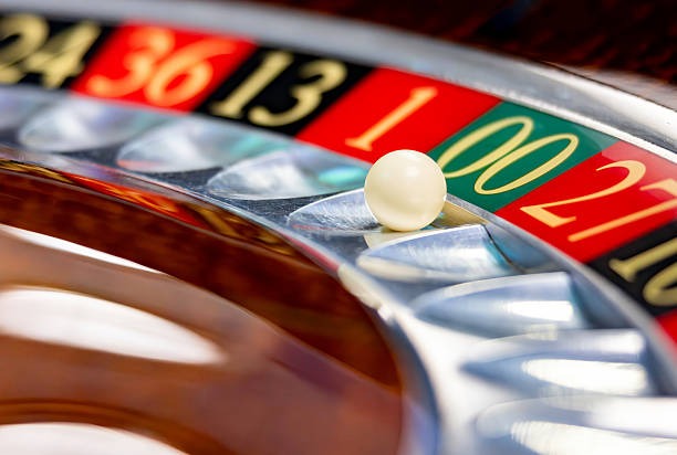 HD live dealer studio with baccarat and roulette tables